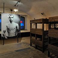 Picture of prisoner and bunk beds in barrack room at the Fort Breendonk, Belgium