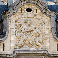 The Mammelokker, a bas-relief above the entrance to the old warder's house, Ghent, Belgium