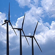 Wind farm turbines against cloudy sky, Los Monegros, Spain
