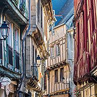 16th century timber framed house fronts in narrow street of the old town in the city Vannes, Morbihan, Brittany, France