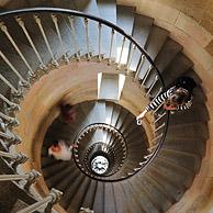Tourist taking picture of spiral staircase inside the lighthouse Phare des Baleines on the island Ile de Ré, Charente-Maritime, France
<BR><BR>More images at www.arterra.be</P>